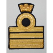 Gradi (paio) per uniforme ordinaria invernale (O.I.) per comandante (Navi di oltre 20.000 tsl) Gradi (paio) per uniforme ordinaria invernale (O.I.) per comandante (Navi di oltre 20.000 tsl)
